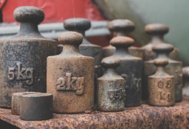rusty set of iron weights for scale in close up view